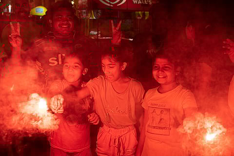 Cricket fans celebrate in Lucknow